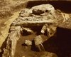 The western part of the tomb is disturbed – here the capstones are already missing. The burial chamber can be excavated deeper in this area. View from the west.