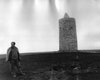 9 April 1987: Finder Harry Sperrharke from Langeneichstädt at the site of the megalithic tomb on the day of its discovery.  In the background the watchtower.