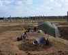 Impression of the excavation: uncovering of the burials. In the background the Pömmelte ring sanctuary.